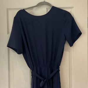 Navy blue romper and never worn.